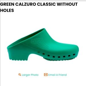 Green Calzuro clogs without holes NWOT never worn